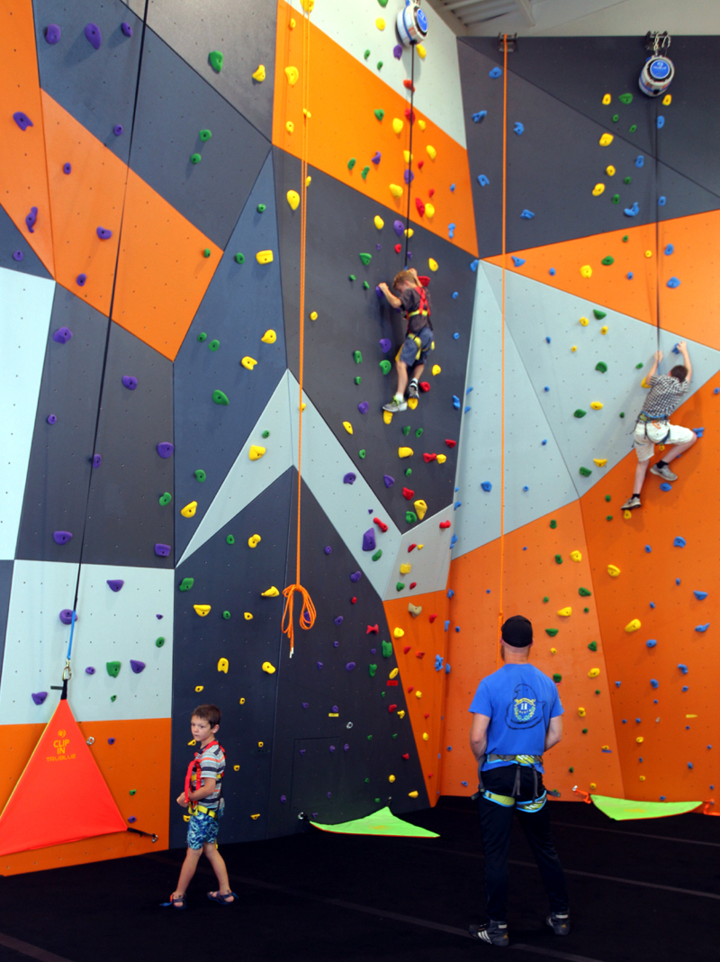 Kids climbing the Boardman Recreational Center climbing wall.