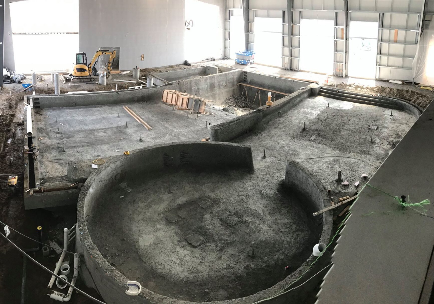 Pool Construction, pouring concrete to form the vortex and other pools.